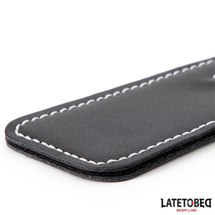 2-in-1 Paddle with feather